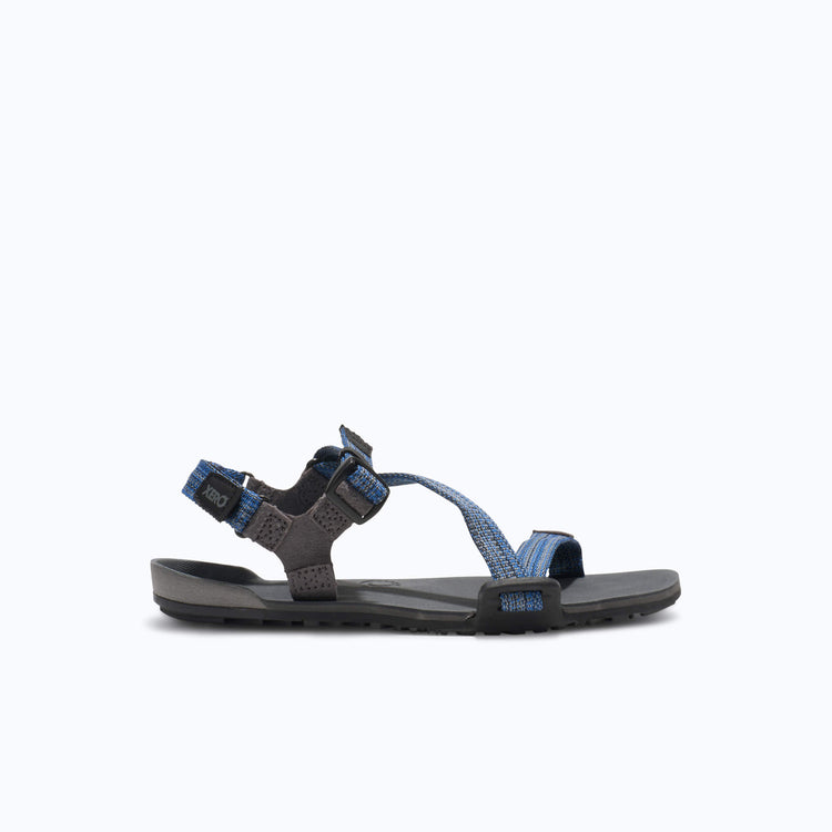 Xero Shoes Z-Trail Big Kids Sandal in Blue and Dark Gray with Toe Facing Right